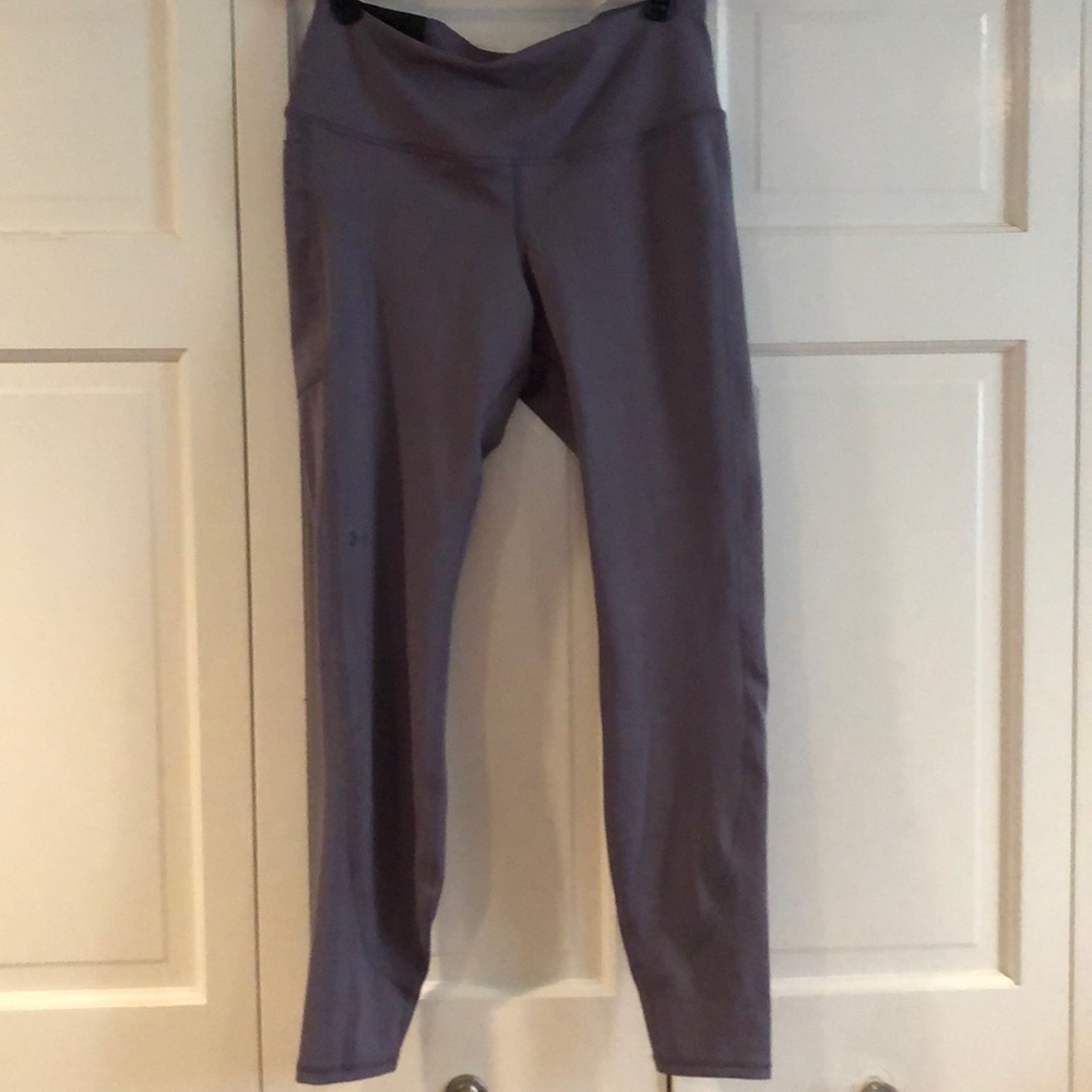 Brand new Under Armour purple compression high-rise full length leggings.